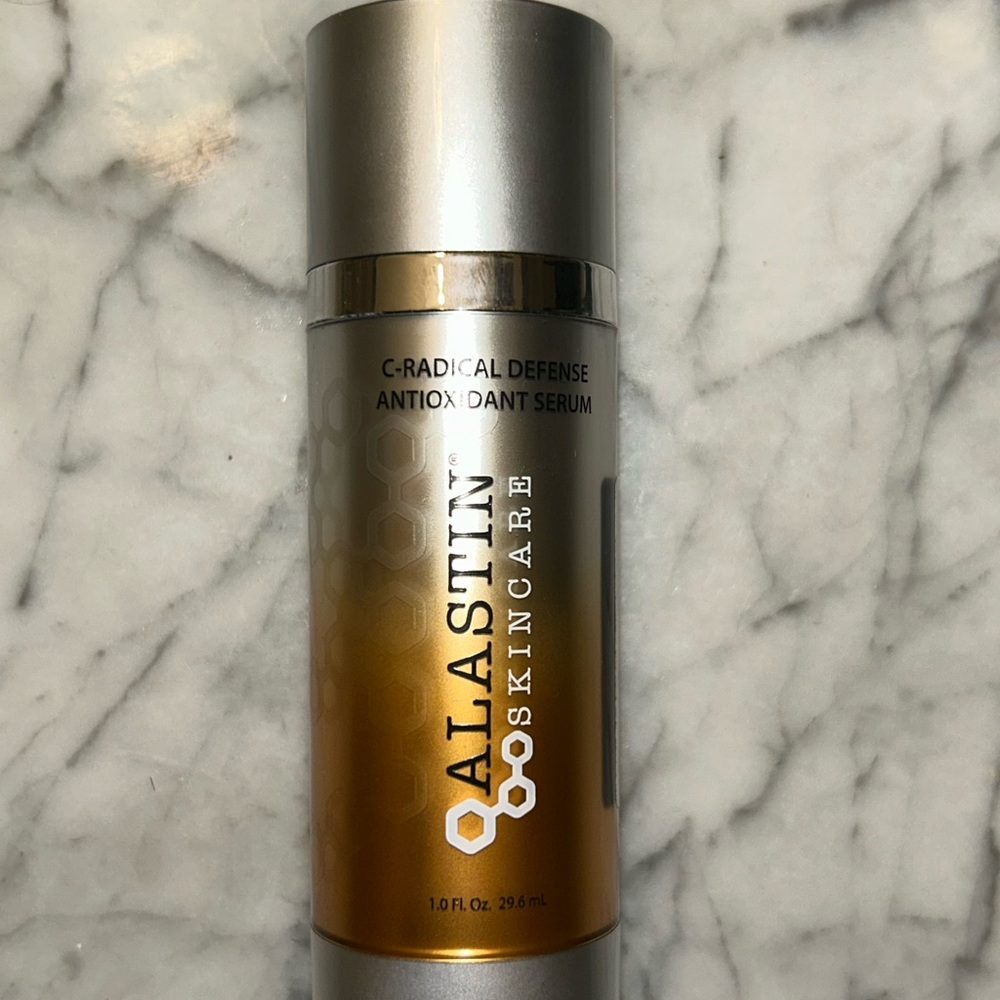 ALASTIN Skincare C-RADICAL Defense Face Serum - Gold/Silver Bottle